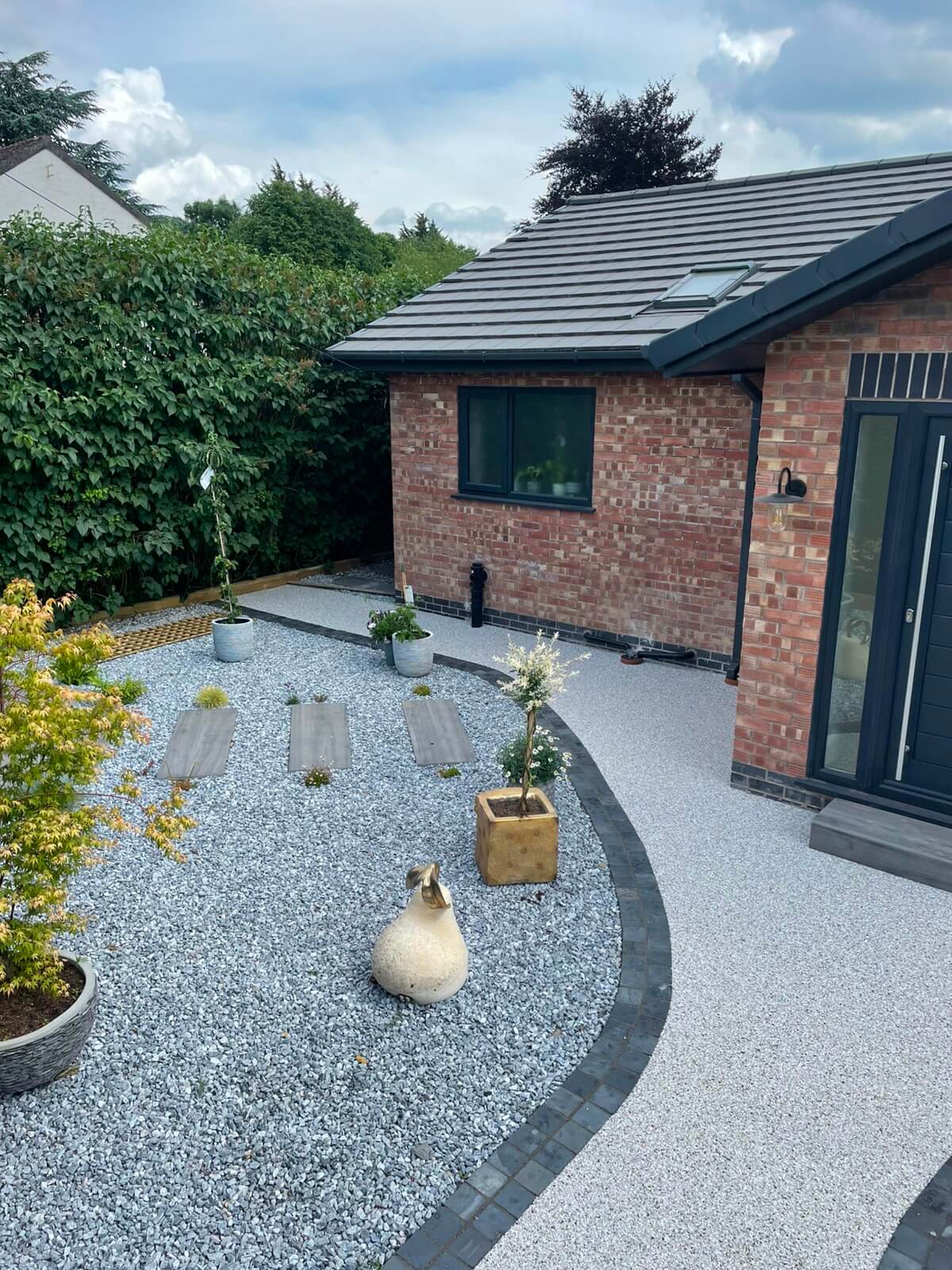 Porcelain patio and landscaped lawn installation completed in Cheshire