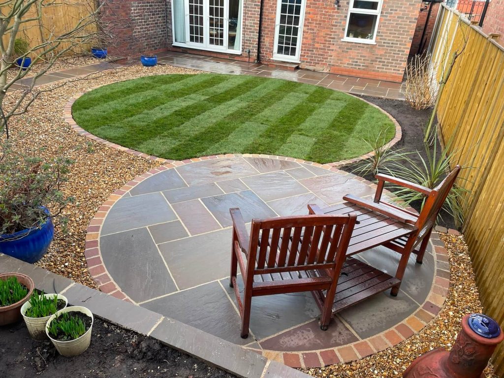 Modern outdoor entertaining space with landscaped patio area